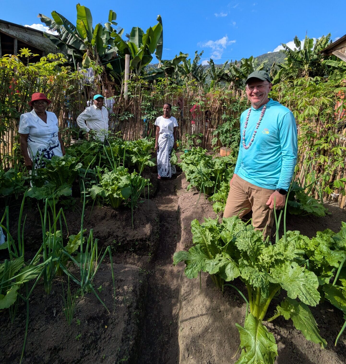 Greg in a garden in Madagascar